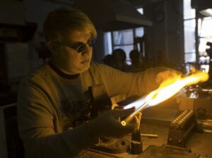 Kyle Meyer, master glass blower at the Center for Applied Isotope Studies at the University of Georgia, works on some glass in Athens, Georgia, Wednesday, March 15, 2017. (Photo/Austin Steele, info@austinsteelephoto.com)